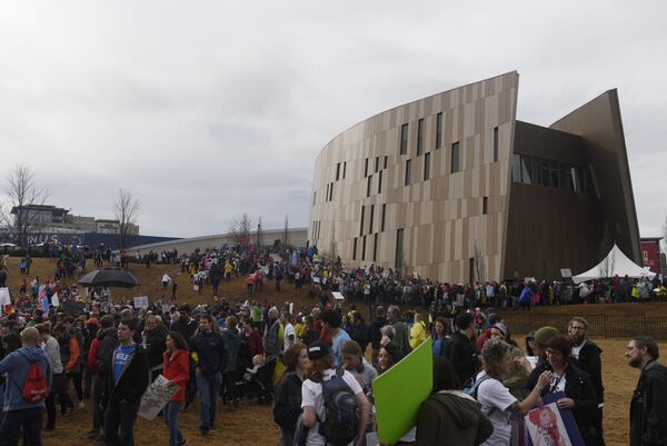 Marchers take to the streets in this January 2017 photo, as they leave the Center for Civil and Human Rights before the start of the Women’s March in Atlanta. The center hosts a gallery devoted to the papers of Martin Luther King Jr., and also serves as an occasional gathering place for leaders in the human rights movement. DAVID BARNES / SPECIAL TO THE AJC