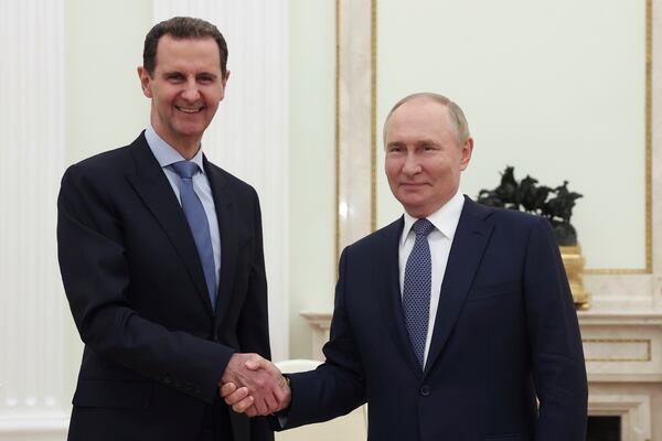 FILE - Syrian President Bashar Assad, left, and Russian President Vladimir Putin shake hands during their meeting in Moscow, July 24, 2024. (Valery Sharifulin, Sputnik, Kremlin Pool Photo via AP, File)