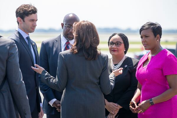 06/18/2021 — Atlanta, Georgia — Vice President Kamala Harris greets Senator Jon Ossoff, from left, Senator Raphael Warnock, Congresswoman Nikema Williams and  Atlanta Mayor Keisha Lance Bottoms, right, as she arrives at Hartsfield-Jackson Atlanta International Airport, June 18, 2021. Harris is visiting Atlanta (Alyssa Pointer / Alyssa.Pointer@ajc.com)