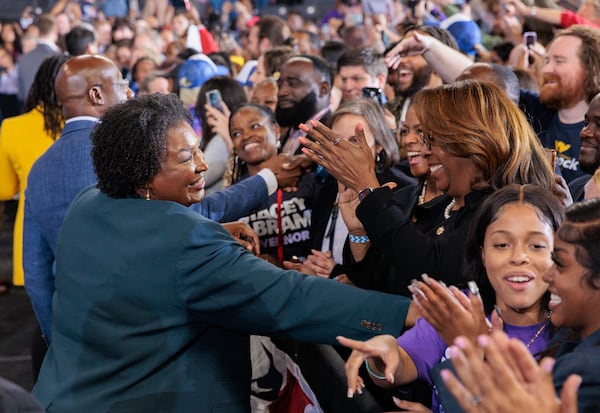 Gubernatorial candidate Stacey Abrams greets voters at a voting rally for Democrats in Atlanta on Oct. 28, 2022. Former President Barack Obama also attended the rally. (Arvin Temkar / arvin.temkar@ajc.com)