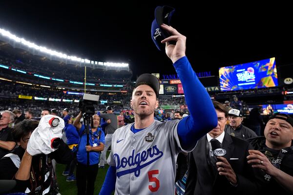 Los Angeles Dodgers' Freddie Freeman celebrates after the Dodgers beat the New York Yankees in Game 5 to win the baseball World Series, Wednesday, Oct. 30, 2024, in New York. (AP Photo/Godofredo A. Vásquez)