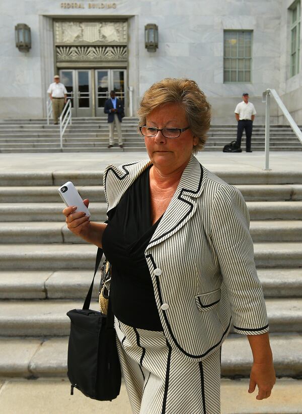 090314 ATLANTA: Former DeKalb County Commissioner Elaine Boyer makes no comment leaving federal court after her arraignment hearing for bilking taxpayers out of thousands of dollars through a kickback scheme on Wednesday, Sept. 3, 2014, in Atlanta. CURTIS COMPTON / CCOMPTON@AJC.COM