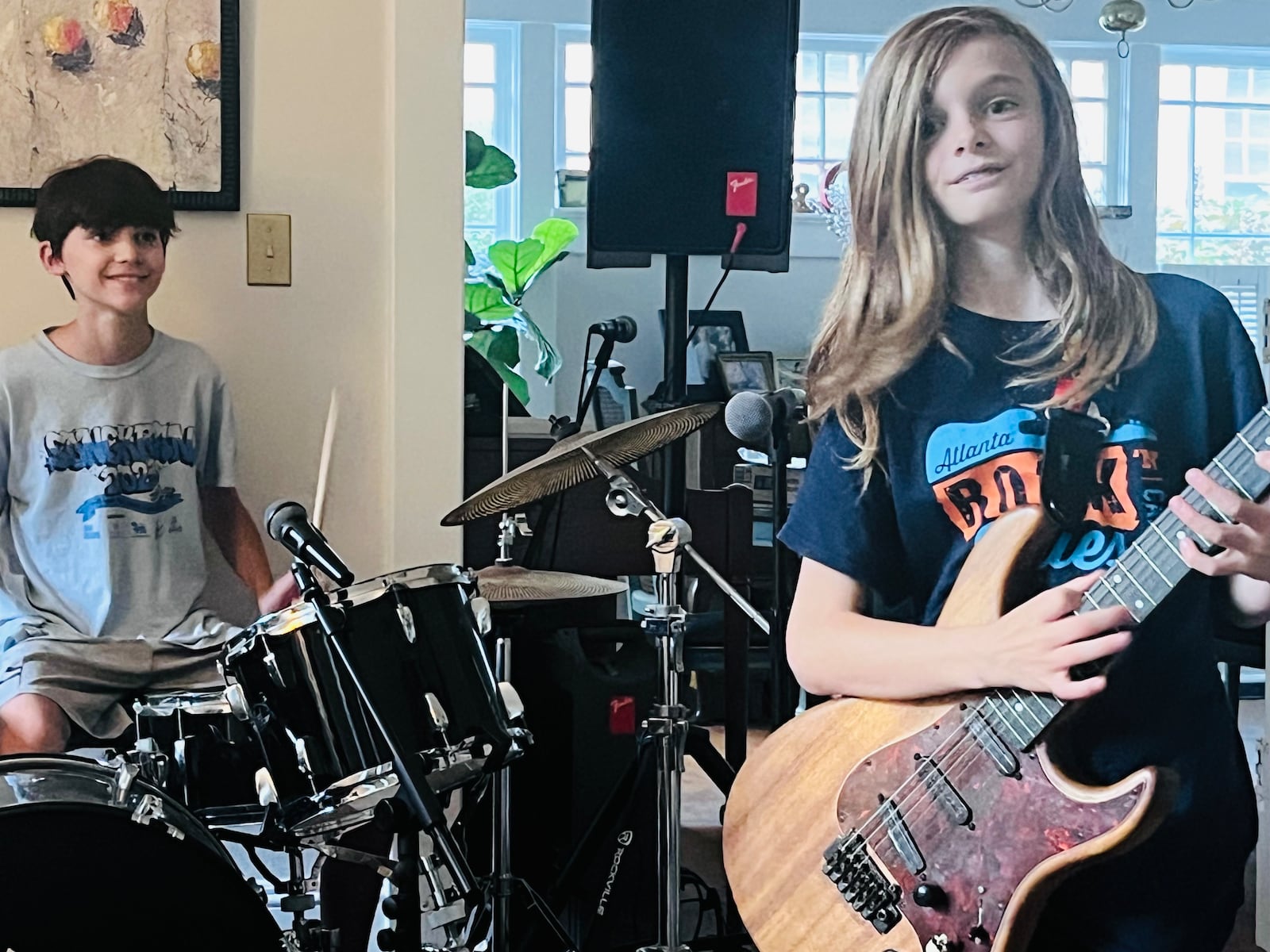 Some of the youngest musicians at Oakhurst Porchfest on Saturday will be Decatur brothers George Meagher, 10, on guitar, and Henry Meagher, 13, on drums. They call themselves King Moon Raiser. Courtesy of the Meagher family. 