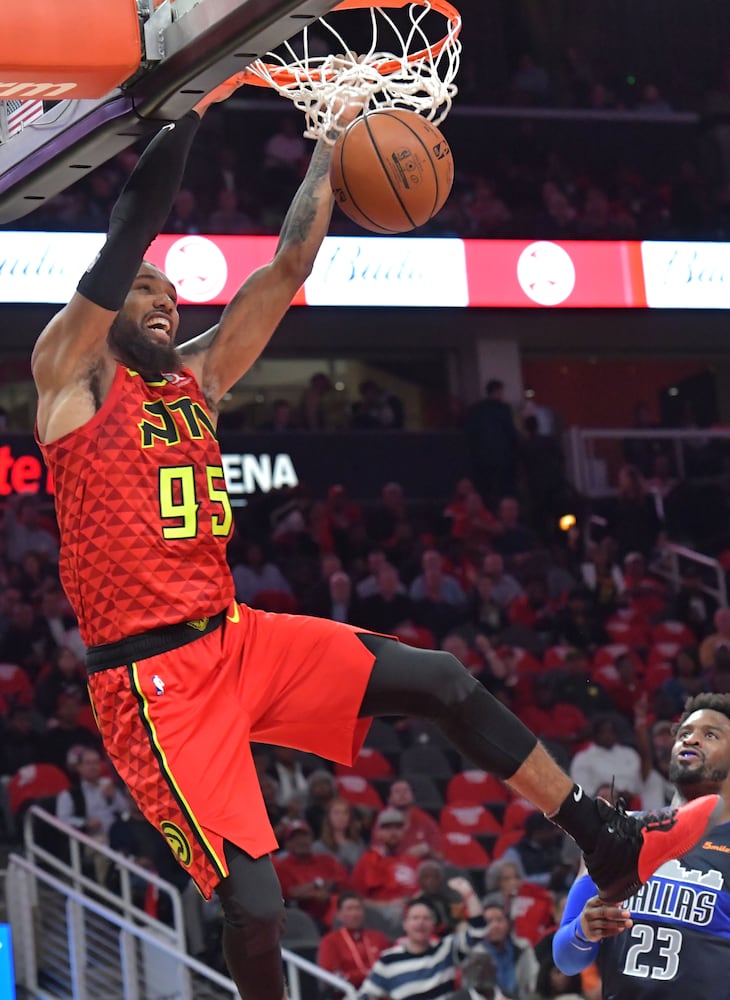 Photos: Hawks rally to beat Mavs in home opener