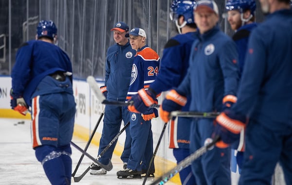 Canadian Prime Minister Mark Carney skates with the Edmonton Oilers NHL hockey team during a visit to Edmonton, Alberta, Thursday, March 20, 2025. (Jason Franson/The Canadian Press via AP)