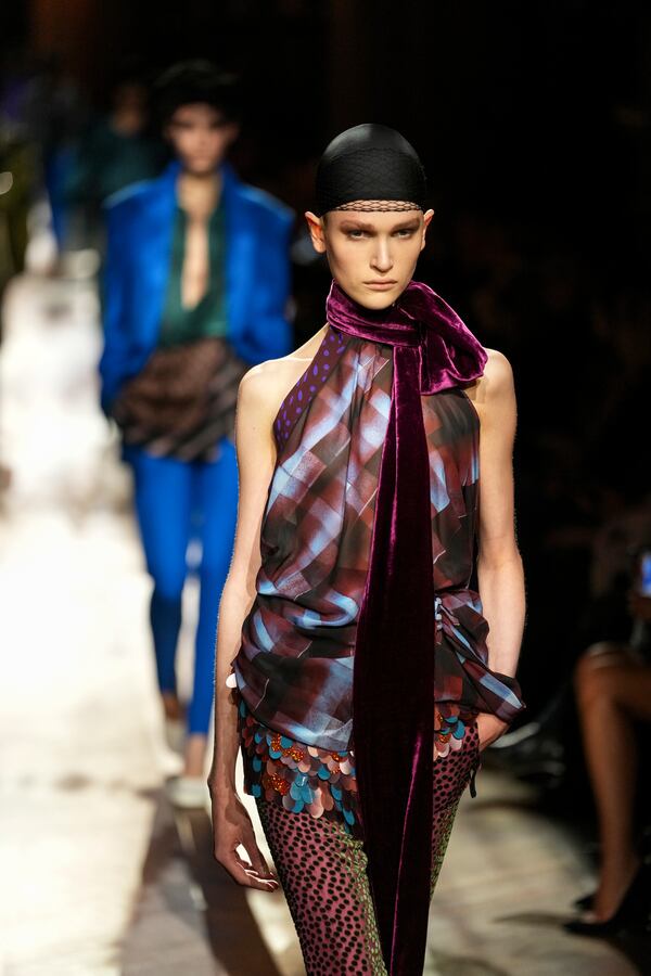 A model wears a creation as part of the Dries Van Noten Fall/Winter 2025-2026 Womenswear collection presented in Paris, Wednesday, March 5, 2025. (Photo by Scott A Garfitt/Invision/AP)