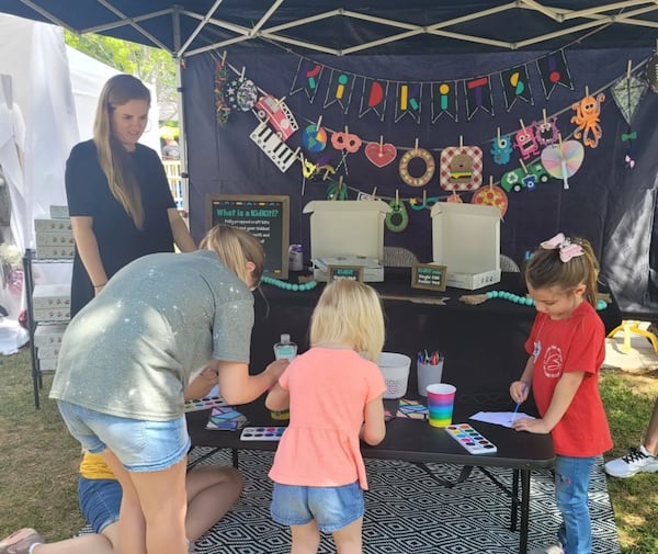 Not everything at the Braselton Antique & Artisan Summer Festival is old. Some booths encourage even the youngest visitors to create something totally new.