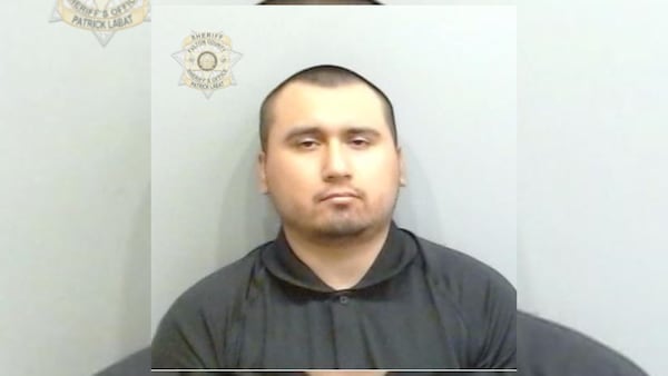 Edward Espinoza, 23, is charged in the death of a Roswell police officer, the GBI said. Fulton County Sheriff's Office