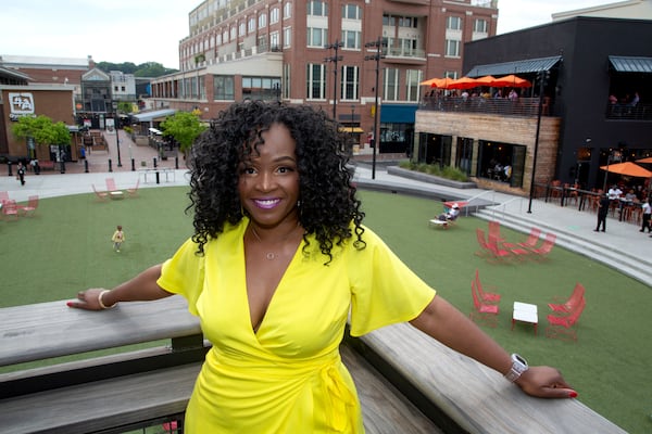 Nikki Forman poses for a photograph at Atlantic Station in Atlanta near her loft on Friday, April 30, 2021. STEVE SCHAEFER FOR THE ATLANTA JOURNAL-CONSTITUTION