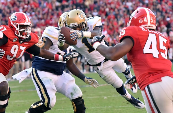 Georgia Tech running back Qua Searcy (1) dives into the endzone for the game winning touchdown at Sanford Stadium on Saturday, November 26, 2016. Georgia Tech won 28-27 over Georgia. HYOSUB SHIN / HSHIN@AJC.COM