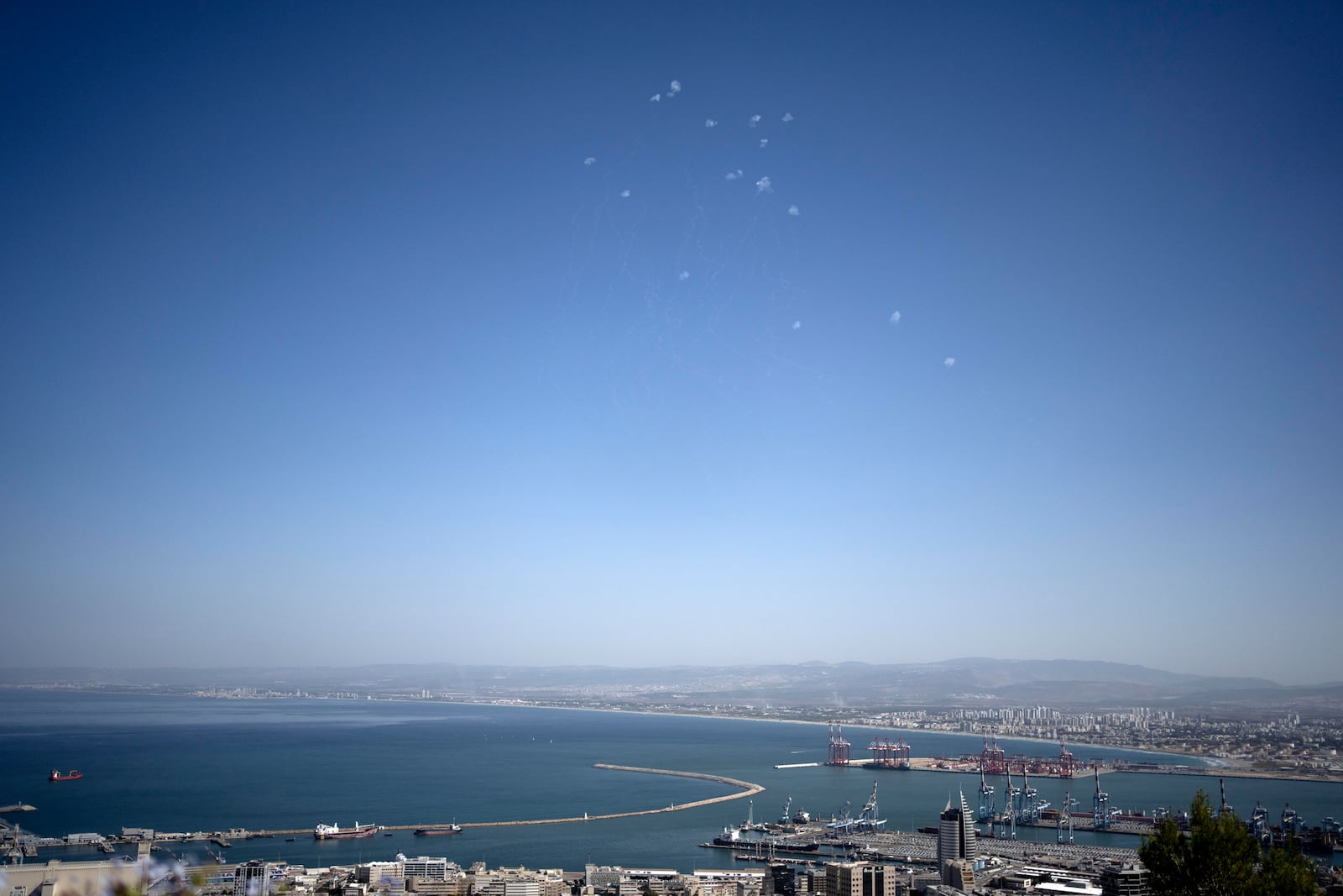 Projectiles fired from Lebanon are intercepted over Haifa, Israel, Wednesday, Oct. 23, 2024. (AP Photo/Maya Alleruzzo)