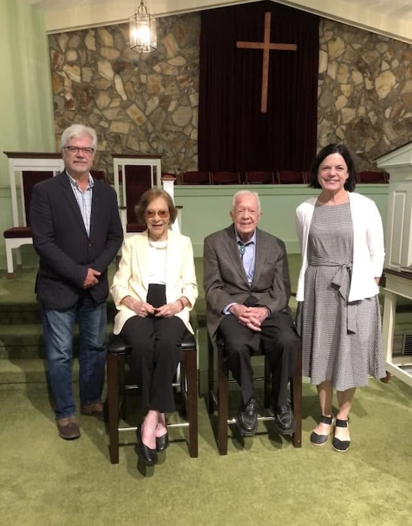 Alice Ensley (far right) and her husband, Doug pose for a photograph with former President Jimmy Carter and Rosalynn Carter.