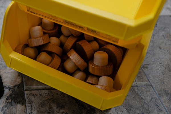 Unused corks are stored in the bottling area of The Bard Distillery in Graham, Ky., Sunday, March 9, 2025. (AP Photo/Jon Cherry)