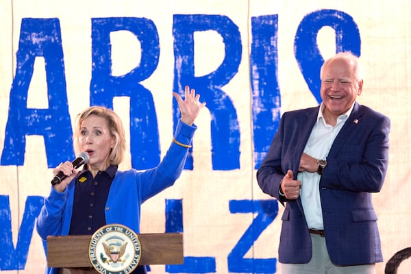 First lady Gwen Walz (left), wife of Minnesota Gov. Tim Walz (right), will campaign for the Democratic presidential ticket in Wisconsin and Minnesota today.