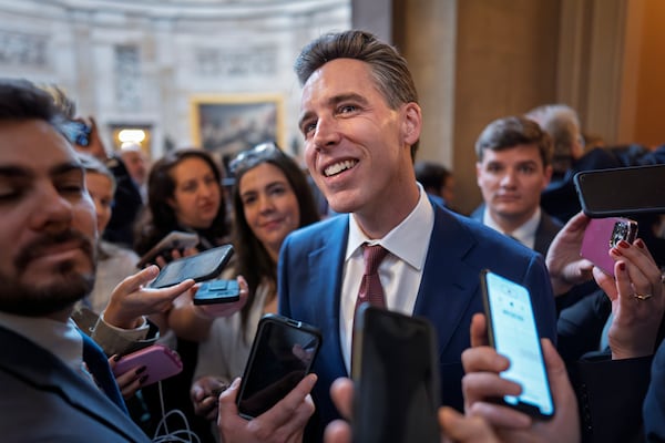 Sen. Josh Hawley, R-Mo., a member of the Senate Judiciary Committee, comments to reporters after meeting in private with former Rep. Matt Gaetz, R-Fla., President-elect Donald Trump's nominee to be attorney general, at the Capitol in Washington, Wednesday, Nov. 20, 2024. (AP Photo/J. Scott Applewhite)