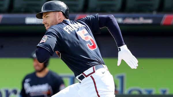 Off and running Atlanta Braves first baseman Freddie Freeman tries to beat out a ground ball during the fourth inning making his first scheduled spring training appearance against the Minnesota Twins in an MLB spring training baseball game at CoolToday Park on Friday, March 5, 2021, in North Port. The Twins turned a double play on Freeman. Curtis Compton / Curtis.Compton@ajc.com