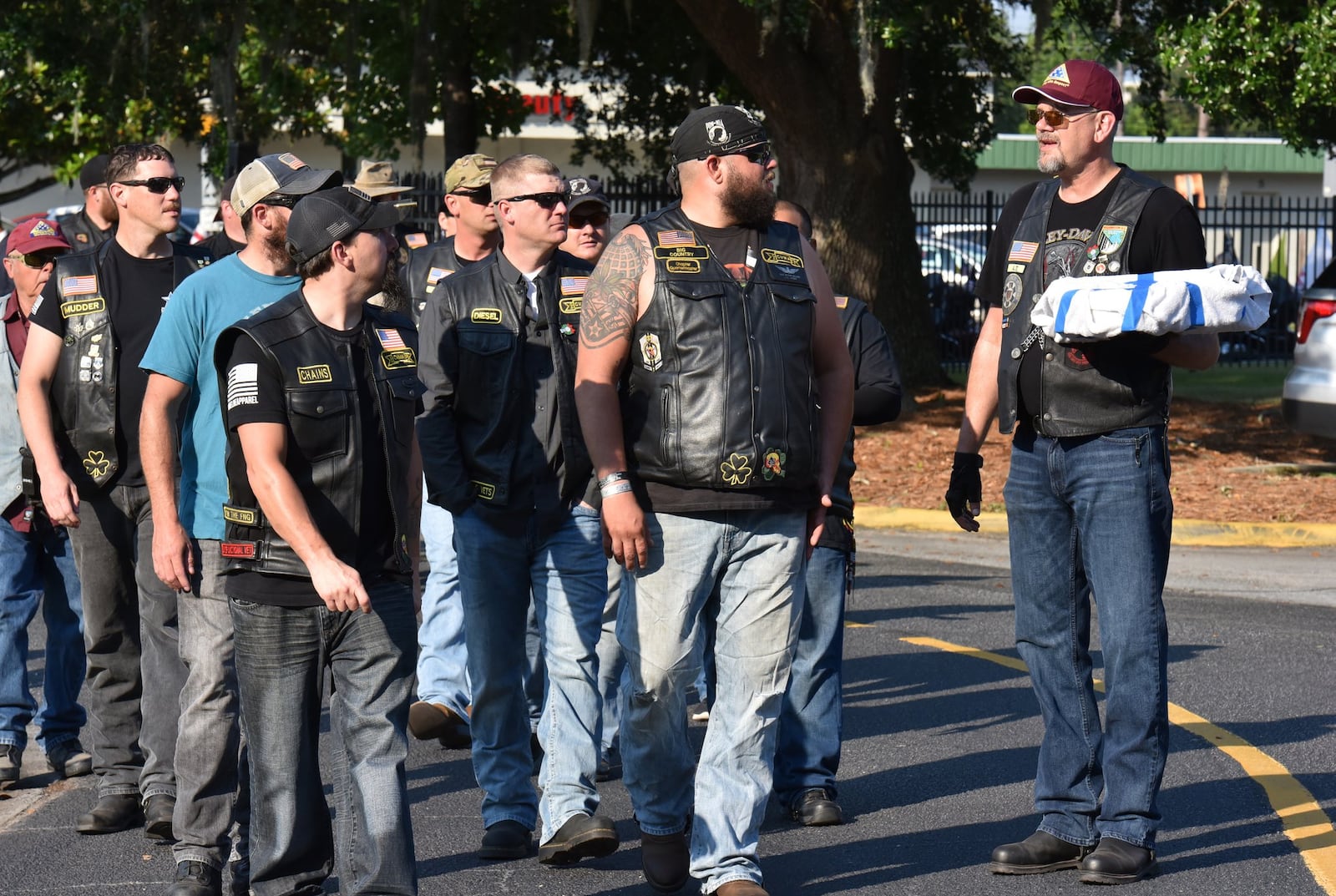 Patriot Guard Riders assemble at the funeral service for Savannah police officer Kelvin Ansari. The guard has expanded its mission to include offering tribute to firefighters, police officers and other public safety personnel. HYOSUB SHIN / HSHIN@AJC.COM