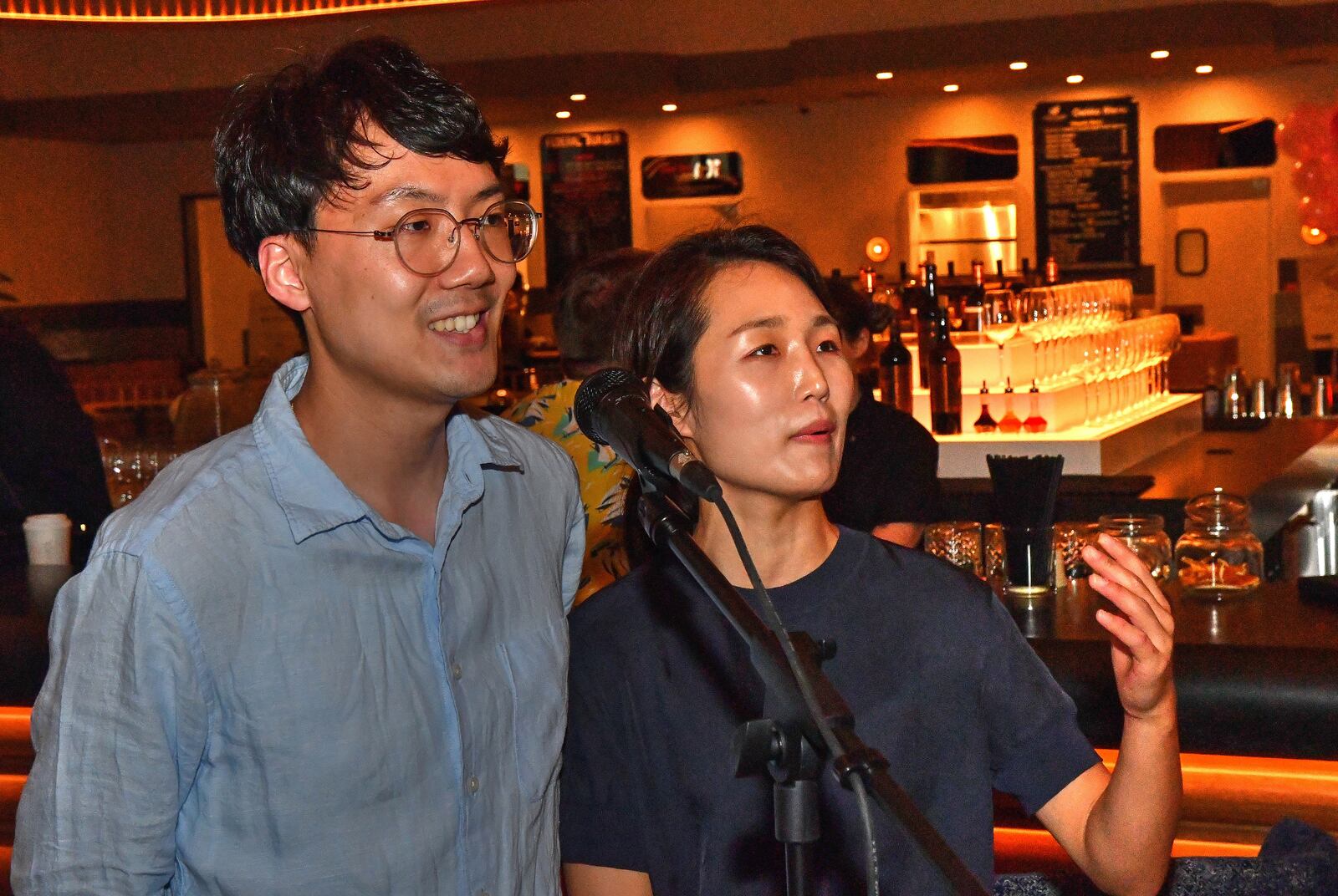 Yoon Soo (Alex) Kim (left) and Mindy Kim of Unbelibubble talk about their offerings at Colony Square's Politan Row, such as high-quality bubble tea, crafted with fresh boba and house-made syrup. (Chris Hunt for The Atlanta Journal-Constitution)