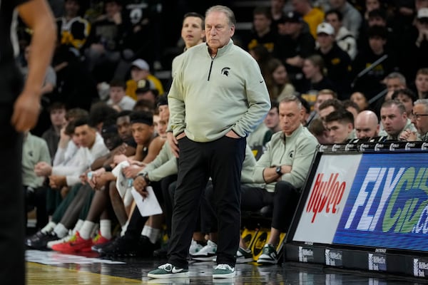 Michigan State head coach Tom Izzo, center, watches from the bench during the first half of an NCAA college basketball game against Iowa, Thursday, March 6, 2025, in Iowa City, Iowa. (AP Photo/Charlie Neibergall)