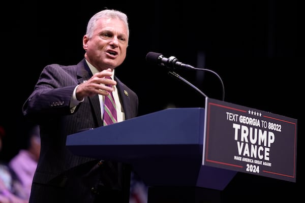 Rep. Buddy Carter, R-Ga., speaks before Republican presidential candidate former President Donald Trump arrives to deliver remarks on the tax code, and manufacturing at the Johnny Mercer Theatre Civic Center, Tuesday, Sept. 24, 2024, in Savannah, Ga. (AP Photo/Evan Vucci)