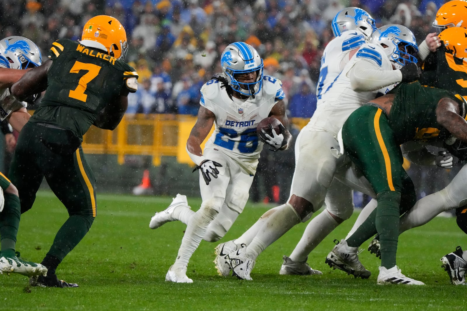 Detroit Lions running back Jahmyr Gibbs (26) runs for a touchdown during the second half of an NFL football game against the Green Bay Packers, Sunday, Nov. 3, 2024, in Green Bay, Wis. (AP Photo/Morry Gash)