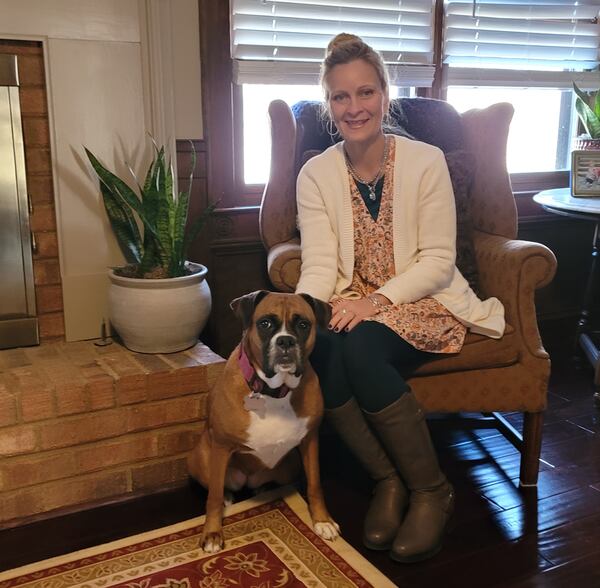 Courtney Fizer and Bonnie the boxer. Courtesy of Courtney Fizer