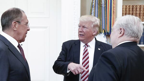 WASHINGTON, D.C., USA - MAY 10, 2017: Russia's Foreign Minister Sergei Lavrov, US President Donald Trump, and Russian Ambassador to the United States Sergei Kislyak (L-R) talking during a meeting in the Oval Office at the White House. Alexander Shcherbak/TASS (Photo by Alexander Shcherbak\TASS via Getty Images)