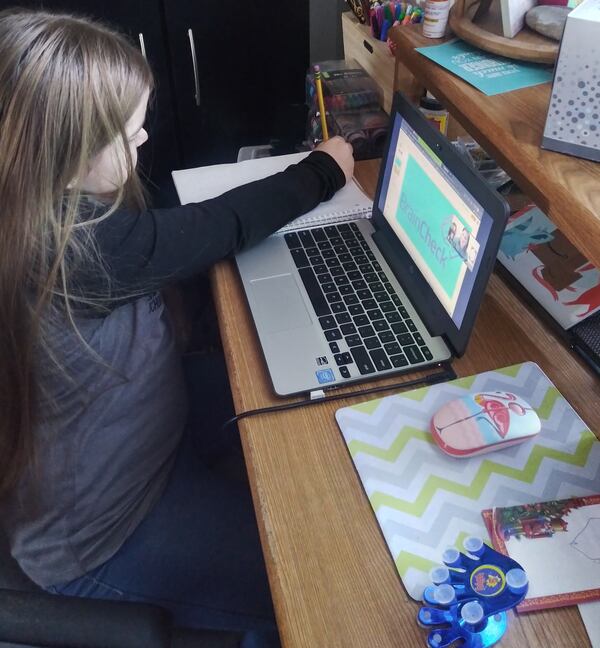 Charlotte Kitchens, 8, attends third grade online in Houston County.