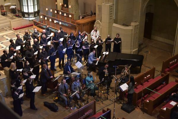 Theodicy Jazz Collective plays with a combined choir at the Church of the Heavenly Rest in New York City in January. The Rev. Andrew Barnett is at the piano. Photo: Courtesy of Theodicy Jazz Collective