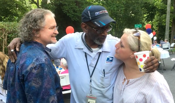 Floyd Martin with Michael and Mamie Hodnett at his retirement party. Photo: Jennifer Brett