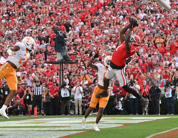 Georgia's wide receiver Marcus Rosemy-Jacksaint (1) catches a touchdown pass during the first half in an NCAA football game at Sanford Stadium in Athens on Saturday, November 5, 2022. (Hyosub Shin / Hyosub.Shin@ajc.com)