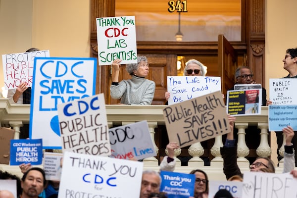 Supporters and public health workers, including fired Centers for Disease Control and Prevention workers, gather at the Capitol in Atlanta on Friday, Feb. 21, 2025, to protest the CDC cuts of hundreds of employees. (Arvin Temkar/AJC)