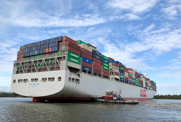 A river pilot craft guides the OOCL Malaysia freighter to a bearth at the Port of Savannah on Monday, March 26, 2018. J. SCOTT TRUBEY/strubey@ajc.com