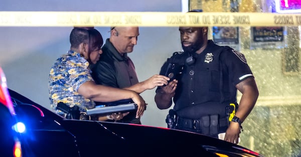 DeKalb police responded around 2 a.m. to Atlanta’s Best Wings in the 6600 block of Covington Highway, where officers found two people suffering from gunshot wounds in critical condition after authorities said they shot each other at a chicken wing restaurant in DeKalb County early Wednesday, June 5, 2024. (John Spink/AJC)