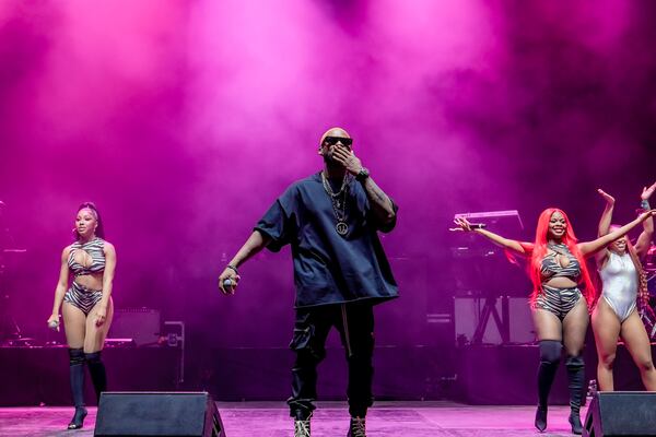 Surprise guest Usher joins City Girls on the Toyota Stage at One Musicfest on Sunday evening.