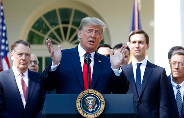 President Donald Trump speaks as he announces a revamped North American free trade deal, in the Rose Garden of the White House in Washington, Monday, Oct. 1, 2018. The new deal, reached just before a midnight deadline imposed by the U.S., will be called the United States-Mexico-Canada Agreement, or USMCA. It replaces the 24-year-old North American Free Trade Agreement, which President Donald Trump had called a job-killing disaster. (AP Photo/Pablo Martinez Monsivais)