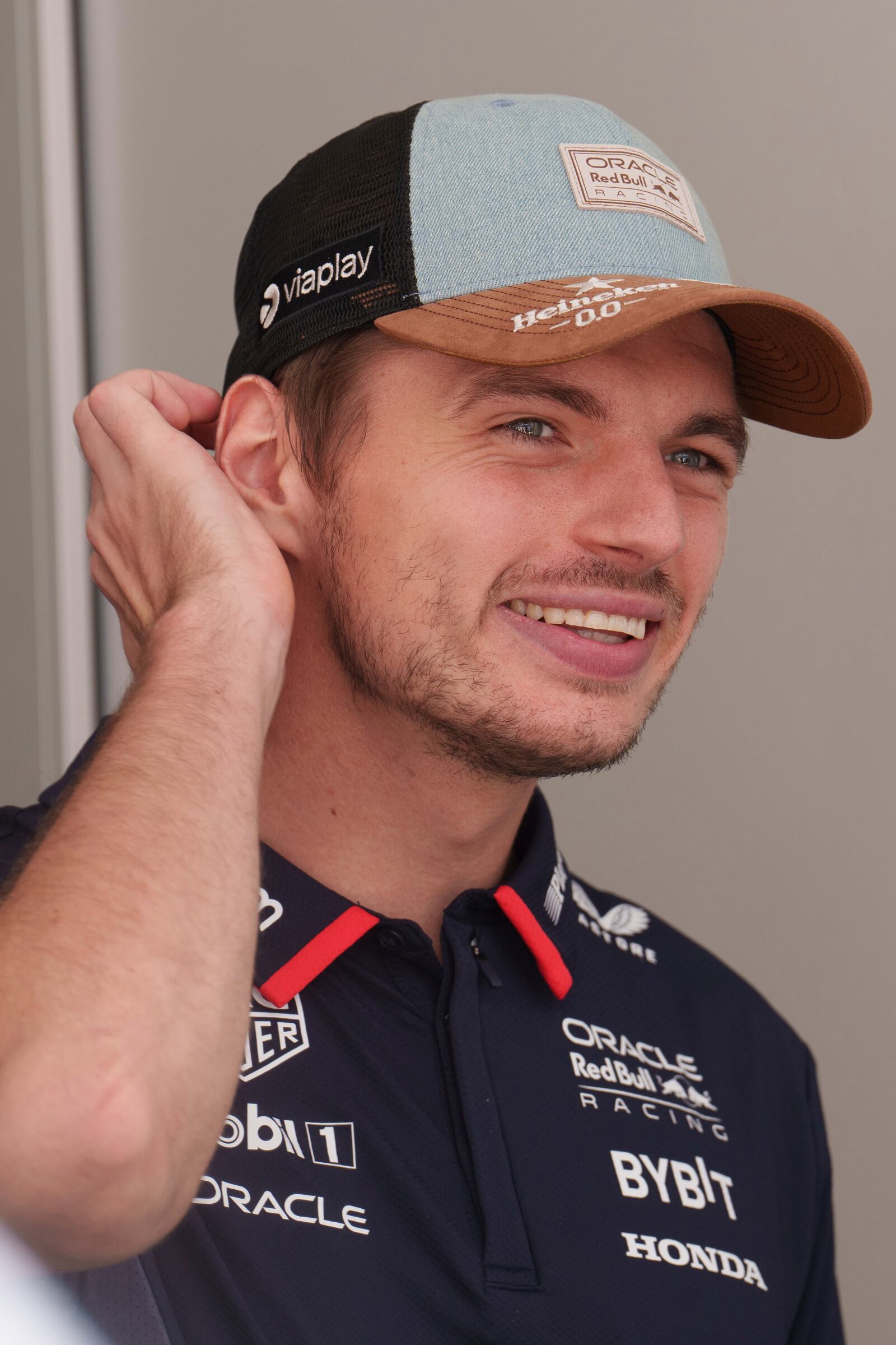 Red Bull driver Max Verstappen, of the Netherlands, talks with fans at the Formula One U.S. Grand Prix auto race at Circuit of the Americas, Saturday, Oct. 19, 2024, in Austin, Texas. (AP Photo/Nick Didlick)