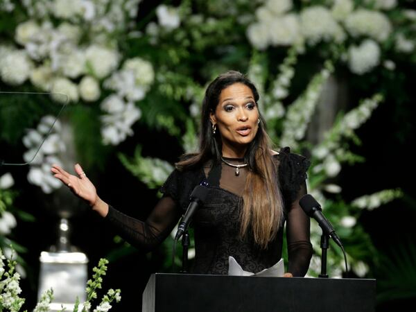 Muhammad Ali's daughter Rasheda Ali Walsh speaks during his memorial service, Friday, June 10, 2016, in Louisville, Ky. (AP Photo/David Goldman)