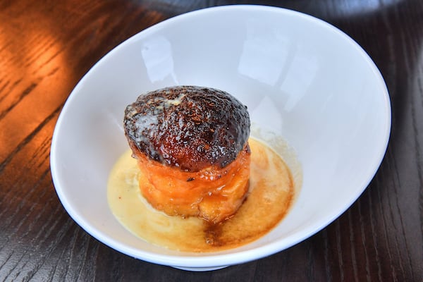 Glazed Donut Bread Pudding, three rum caramel, vanilla creme anglaise. (Contributed by Chris Hunt Photography)