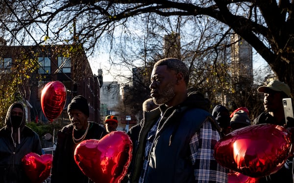 Organizers with the Housing Justice League and Hosea Helps held a vigil for the man Friday on Old Wheat Street at the site of the cleared encampment. Ben Hendren/AJC