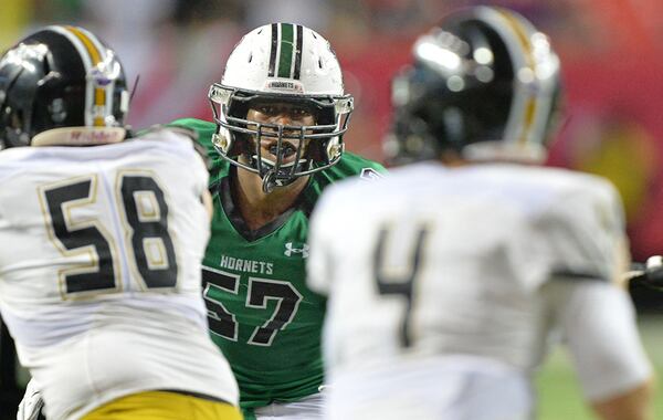 Roswell's Tre' Lamar (57) was an AJC Super 11 selection. (Hyosub Shin/AJC)