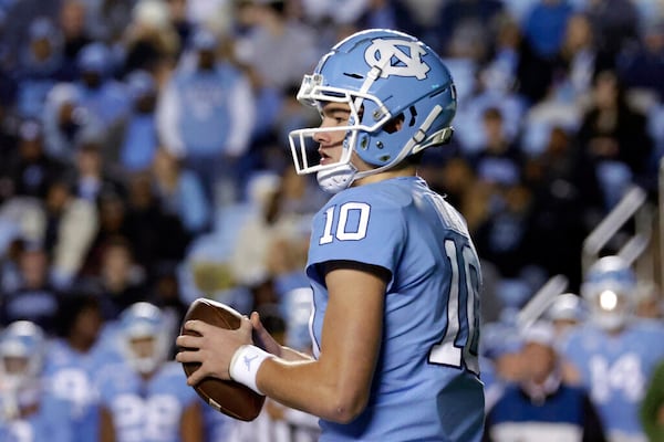 North Carolina quarterback Drake Maye (10) looks to pass during the first half of an NCAA college football game against Georgia Tech, Saturday, Nov. 19, 2022, in Chapel Hill, N.C. (AP Photo/Chris Seward)