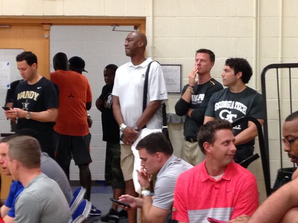 Georgia Tech coach Josh Pastner watches an AAU game at Bishop Gorman High School in Las Vegas July 17, 2017. To Pastner's right are Wake Forest coach Danny Manning (white polo shirt) and Vanderbilt coach Bryce Drew (black t-shirt).