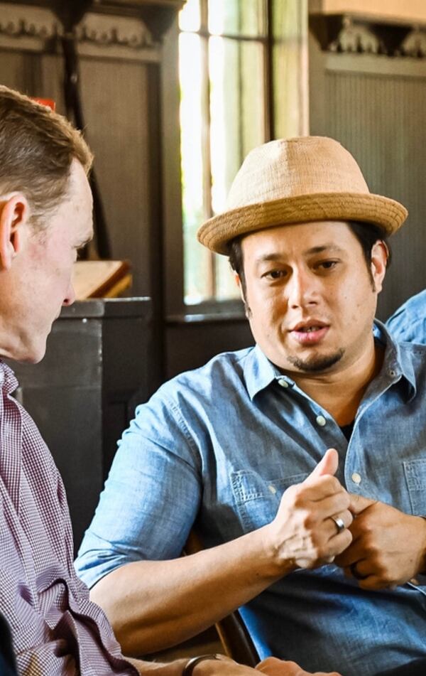 Compass Box founder John Glaser (left) and Eric Simpkins talk about his winning cocktail.