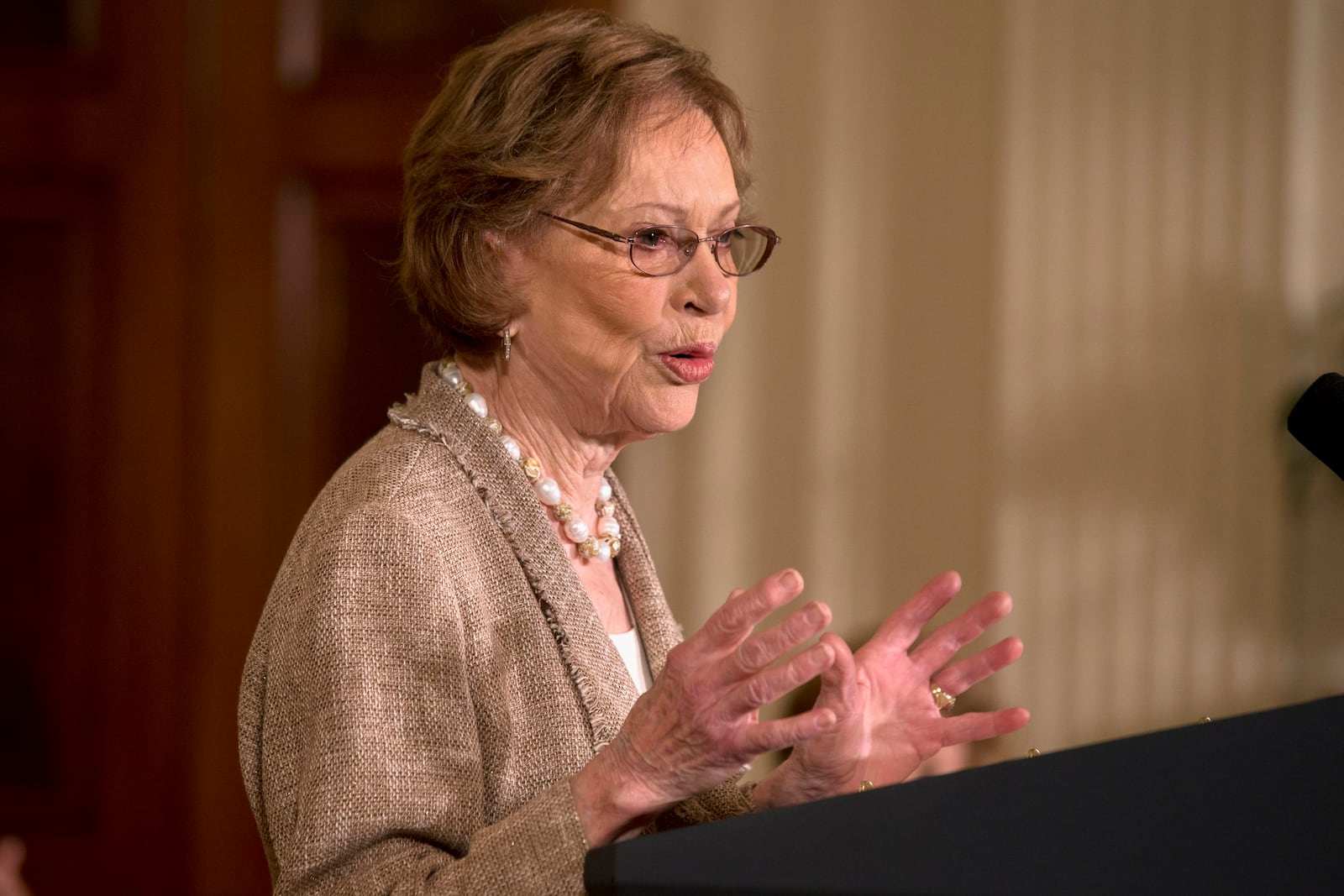 Former first lady Rosalynn Carter speaks during an event for caregivers of veterans, Friday, April 11, 2014, in the East Room of the White House in Washington. The Rosalynn Carter Institute for Caregivers was established in Georgia to provide support and resources for the many unsung heroines and heroes who are family and professional caregivers.. (AP Photo/Jacquelyn Martin)