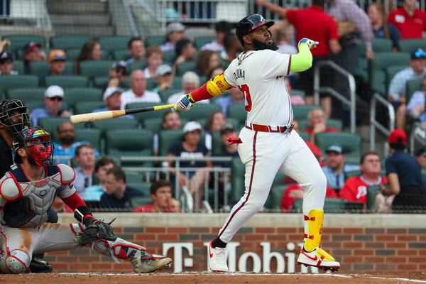 Atlanta Braves designated hitter Marcell Ozuna (20) hits a three-run home run during the first inning against the Boston Red Sox at Truist Park, Wednesday, May 8, 2024, in Atlanta.  (Jason Getz / AJC)
