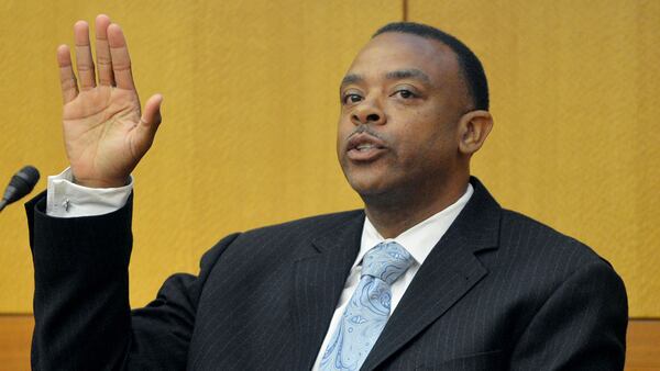 Former Parks Middle School Vice Principal Gregory Reid testifies at the APS trial in 2013. (KENT D. JOHNSON / KDJOHNSON@AJC.COM)