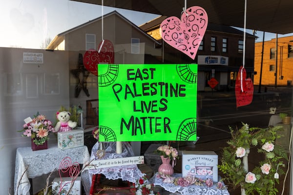 A sign is displayed in Flowers Straight From the Heart in East Palestine, Ohio, on Saturday, Feb.18, 2023, two weeks after the Norfolk Southern train derailment. Because of the derailment the florist missed Valentine's Day sales, so Norfolk Southern bought 100 bouquets of flowers for local nursing home residents. Arvin Temkar / arvin.temkar@ajc.com)