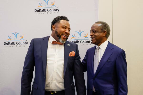 DeKalb Superintendent Devon Horton (left) talks with DeKalb County CEO Michael Thurmond moments before Horton's State of the District address in Decatur on Thursday, March 14, 2024. (Miguel Martinez /miguel.martinezjimenez@ajc.com)