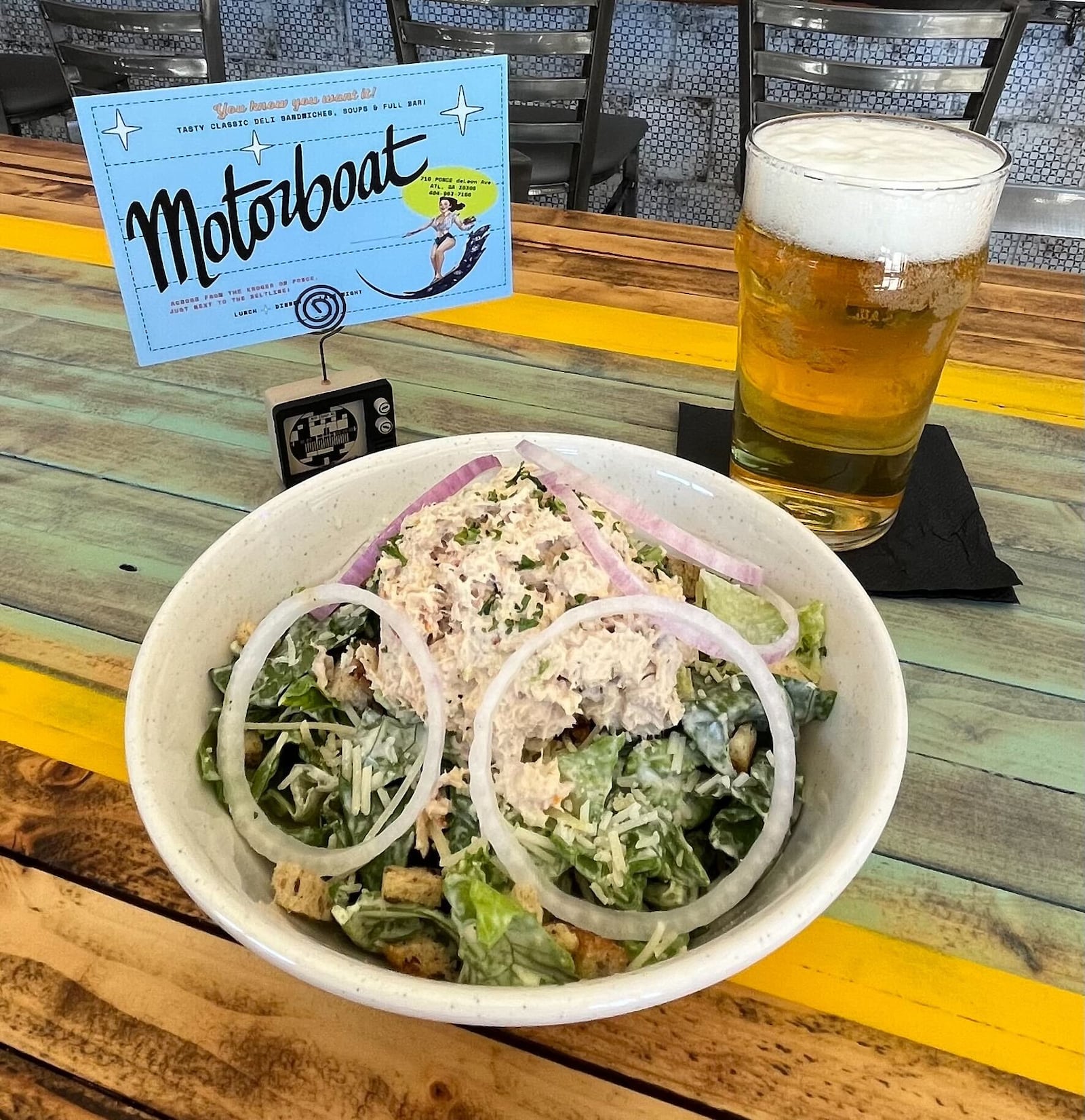 The Caesar salad with a scoop of tuna is on the menu at Motorboat. / Courtesy of Motorboat